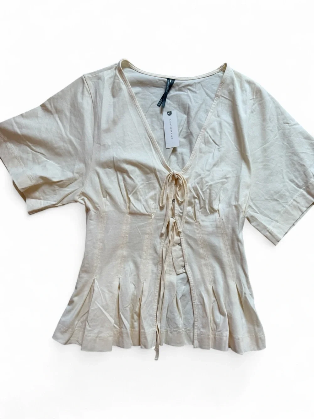 Anthropologie Cream Lace-Up V-Neck Peplum Blouse